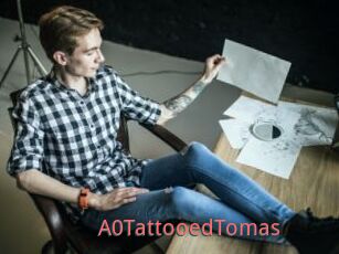 A0TattooedTomas