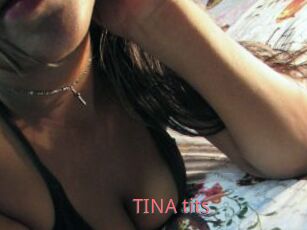 TINA_tits